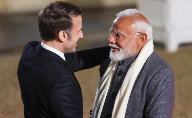 PM Modi meets 'friend' French President  Macron in Paris