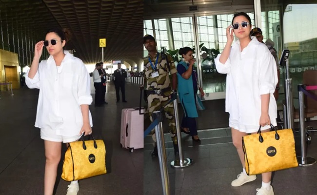 Actress loose-fitting shirt makes paps float pregnancy rumours