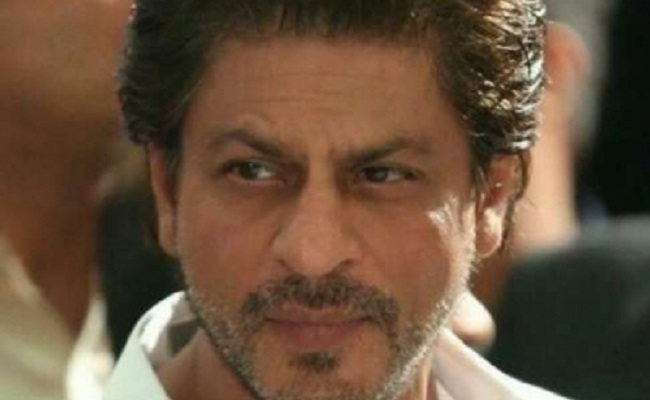 How much does Shah Rukh Khan charge to perform at weddings?